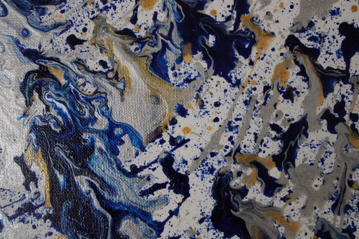 Abstract pattern with blue, gold, and black colors on a textured background